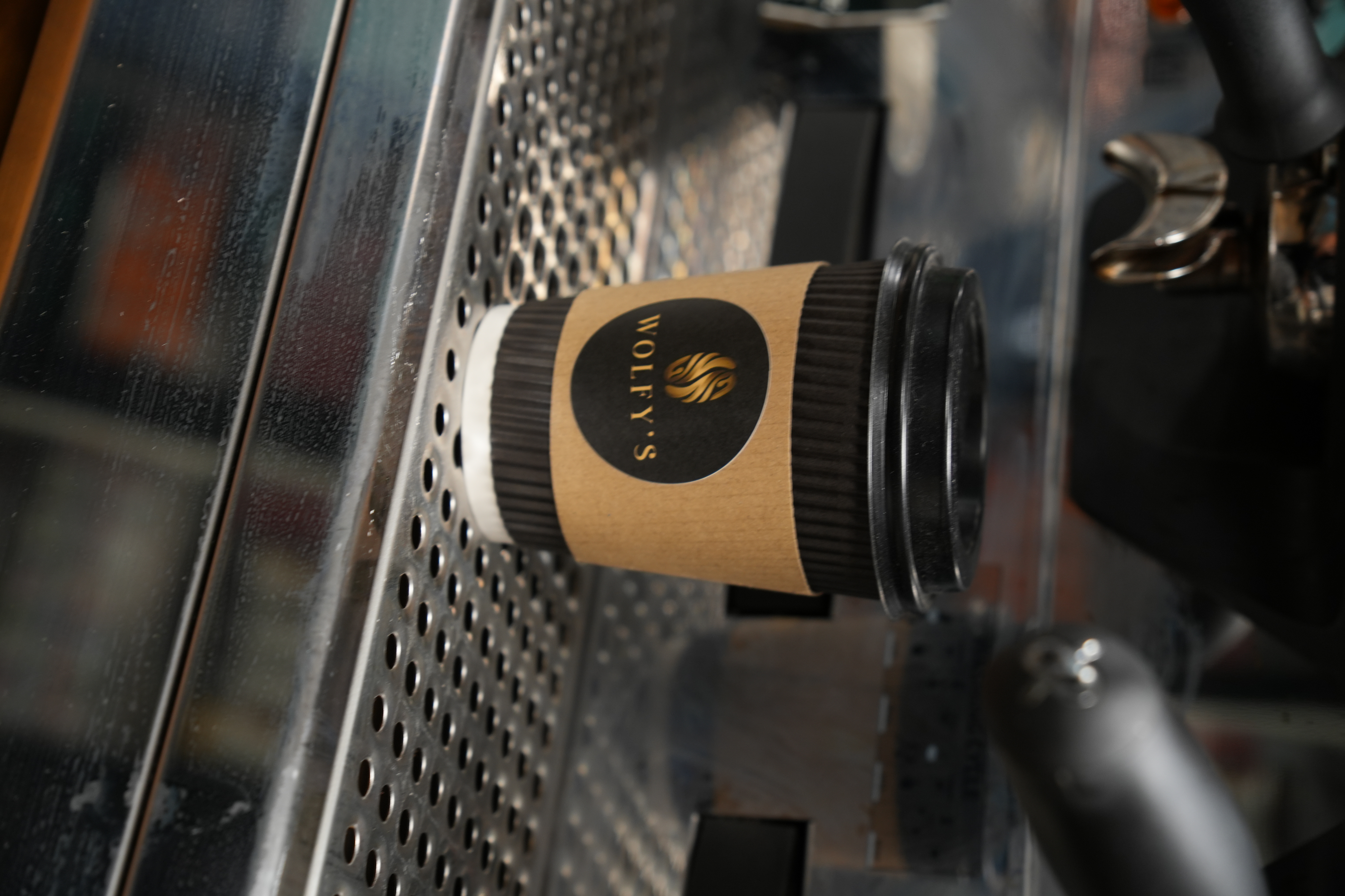 Wolfy's branded coffee cup